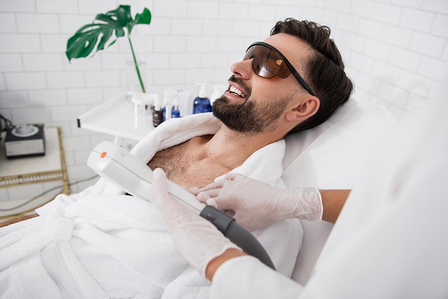 man receiving laser hair removal